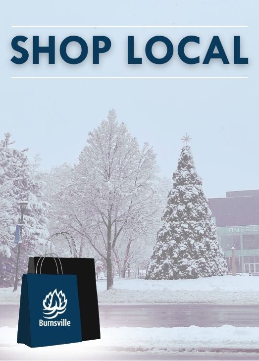 Shop local text with snow covered trees