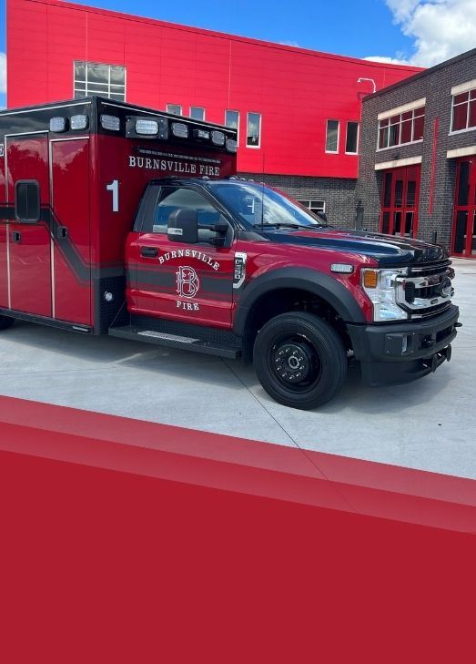 Ambulance in front of fire station