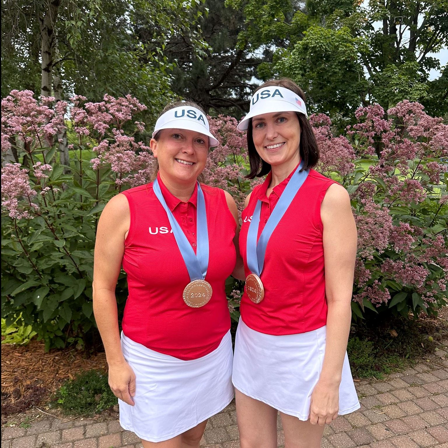 Golfers dressed as olympians