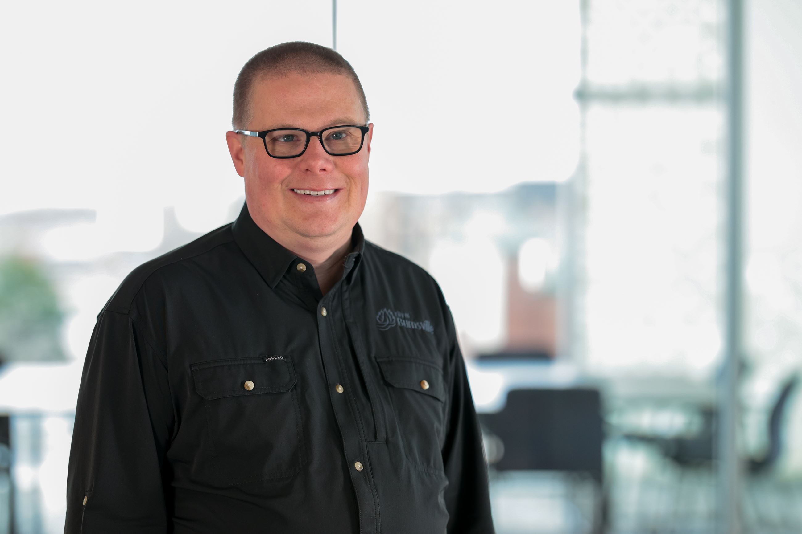 Professional headshot photo of City Manager Gregg Lindberg