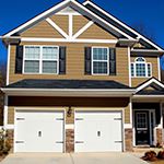 Brown house with white trim